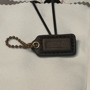 Coach Dark Walnut Micro Leather Hang Tag in Brass- Toned Ball chain.